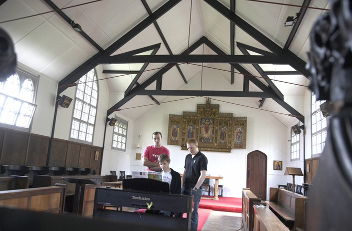 Interior view of St Chad's College chapel, a 'temporary' building that has lasted for over 80 years, probably because it serves its function adequately. 